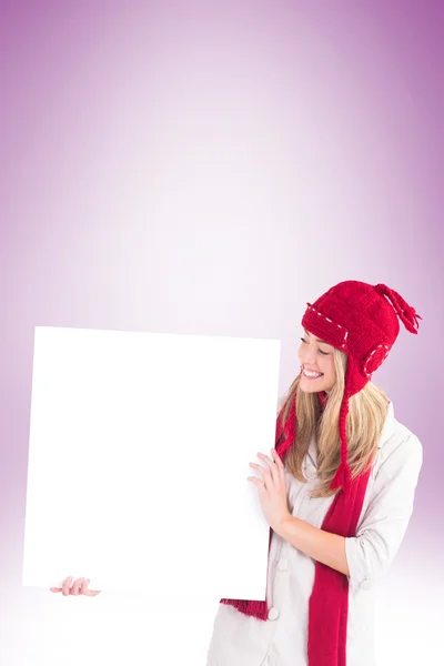 Pretty blonde showing white poster — Stock Photo, Image