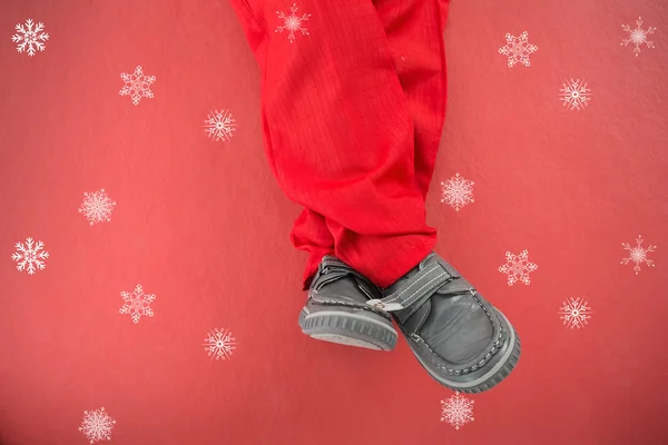 Little boys legs in santa costume — Stock Photo, Image