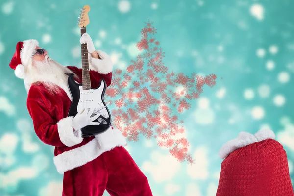 Santa tocando la guitarra eléctrica — Foto de Stock