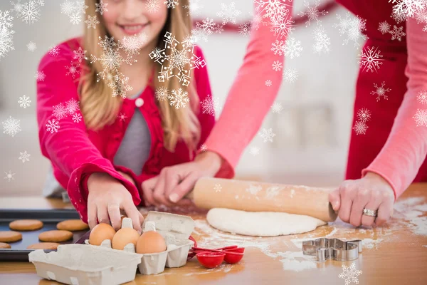 Festive mother and daughter making cookies — Stock Photo, Image