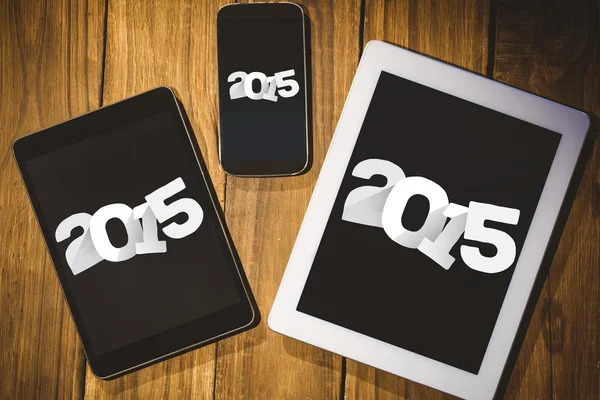 2015 contra tablet e smartphone — Fotografia de Stock