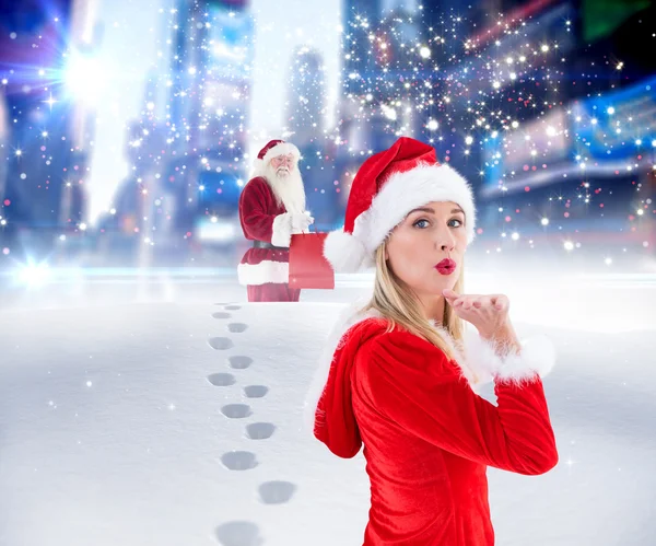Festive blonde blowing a kiss — Stock Photo, Image
