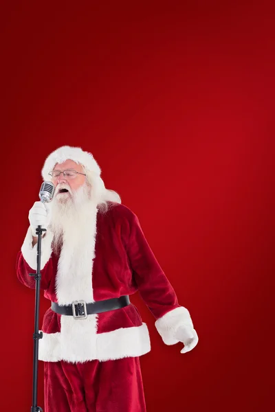 Santa zingt als een superster — Stockfoto