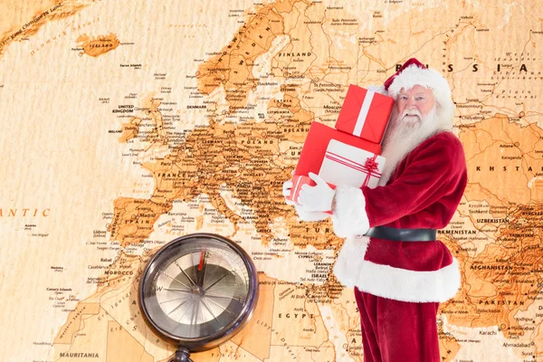 Babbo Natale porta alcuni regali — Foto Stock