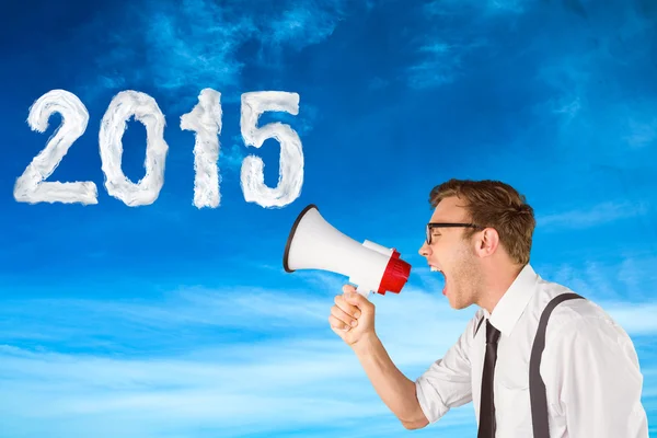 Businessman shouting through megaphone — Stock Photo, Image