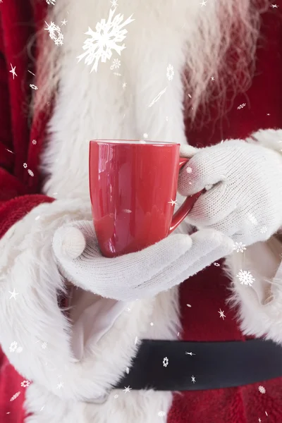 Babbo Natale tiene tazza rossa — Foto Stock