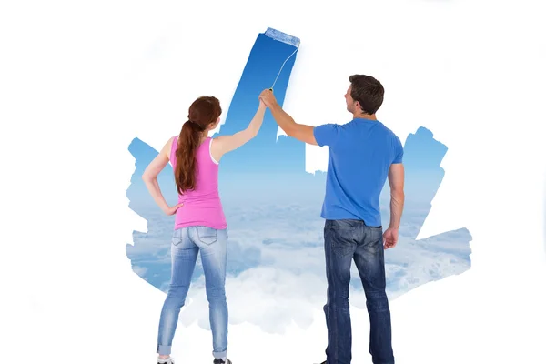 Couple painting together a sky — Stock Photo, Image