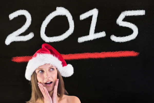 Feestelijke brunette op zoek verrast met handen — Stockfoto