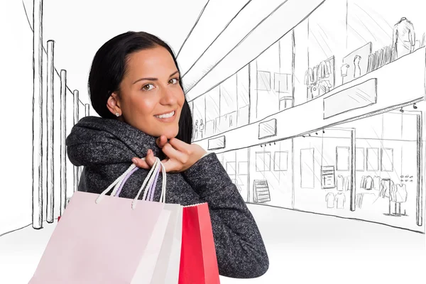 Sorrindo mulher segurando saco de compras — Fotografia de Stock