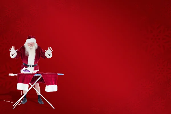 Santa is onder de indruk over iets op broek — Stockfoto