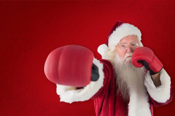 Santa Claus punches with his right — Stock Photo, Image