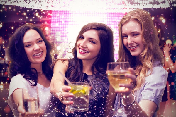 Composite image of friends with drinks — Stock Photo, Image