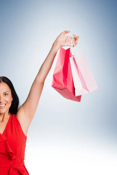 Donna in piedi con borse della spesa — Foto Stock