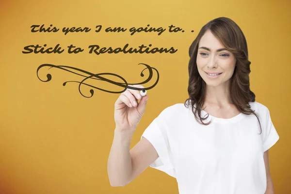 Smiling businesswoman holding marker — Stock Photo, Image