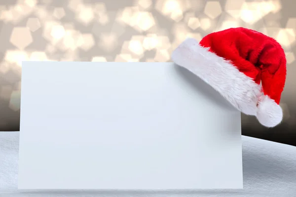Chapéu de Papai Noel no cartaz — Fotografia de Stock