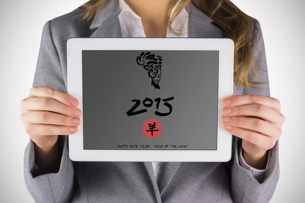 Businesswoman showing tablet — Stock Photo, Image