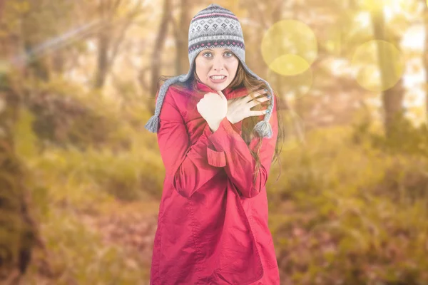 Cold redhead wearing coat and hat — Stock Photo, Image