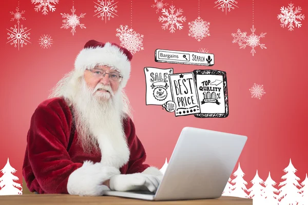 Santa surfar på internet — Stockfoto
