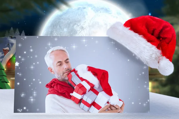 Feliz hombre festivo con regalos — Foto de Stock