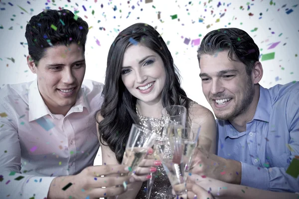 Composite image of friends toasting with champagne — Stock Photo, Image