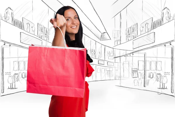 Mulher de pé com saco de compras — Fotografia de Stock