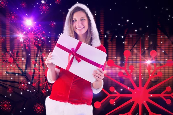 Santa girl hospodářství dárek — Stock fotografie