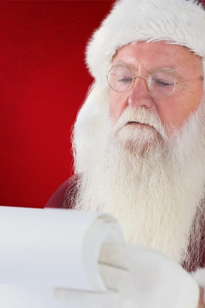 Santa Claus reads list — Stock Photo, Image