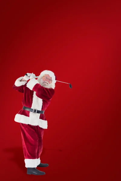 Santa golf oynamak — Stok fotoğraf