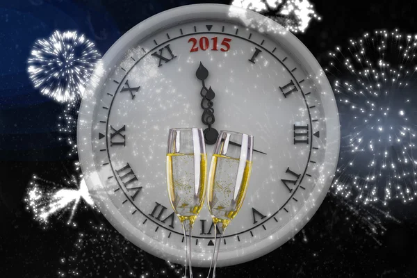 Composite image of clock counting to midnight — Stock Photo, Image
