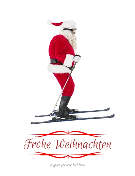 Festive father christmas skiing — Stock Photo, Image