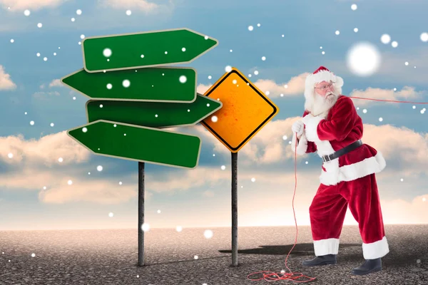 Santa uses a home trainer — Stock Photo, Image