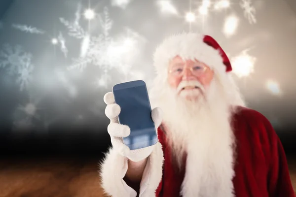 Santa Claus shows smartphone — Stock Photo, Image