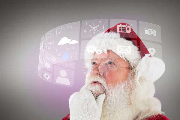 Santa funderar på något — Stockfoto