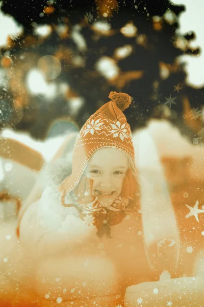 Festive little girl in hat and scarf — Stock Photo, Image