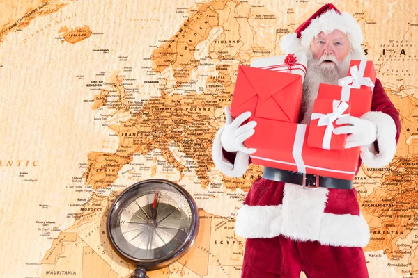 Santa bär några presenter — Stockfoto