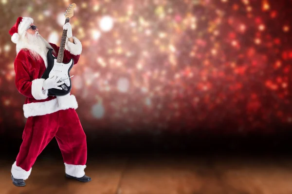 Santa παίζοντας ηλεκτρική κιθάρα — Φωτογραφία Αρχείου