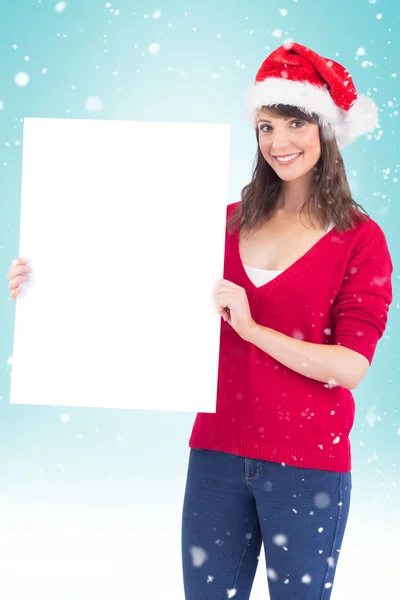 Festive brunette holding poster — Stock Photo, Image