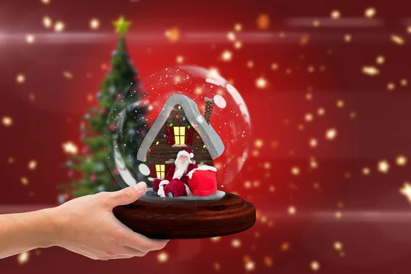 Hand holding snow globe — Stock Photo, Image