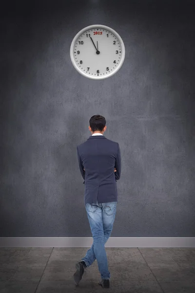 Composite image of casual businessman with arms crossed — Stock Photo, Image