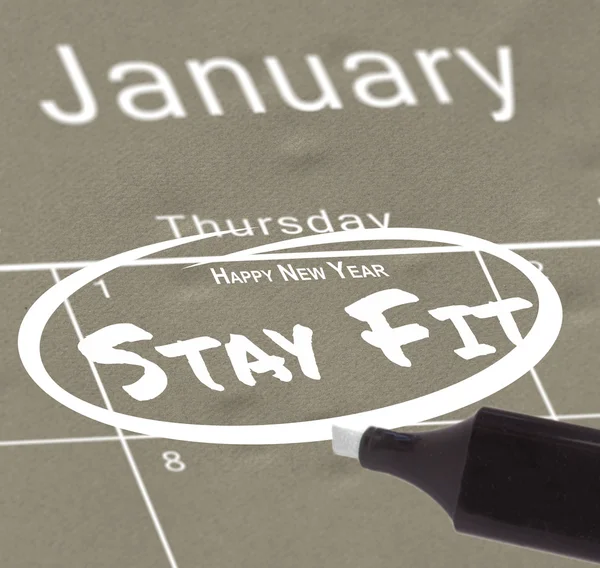 Новогодняя резолюция по календарю — стоковое фото