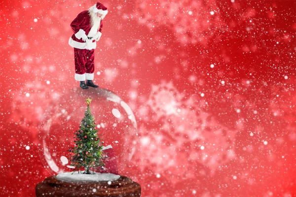 Père Noël debout sur la boule à neige — Photo