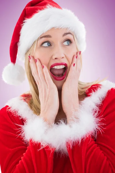 Festive blonde with hands on face — Stock Photo, Image