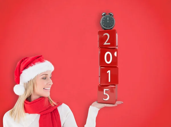 Festive blonde holding hand out — Stock Photo, Image