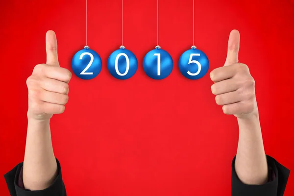 Businesswomans hands showing thumbs up — Stock Photo, Image