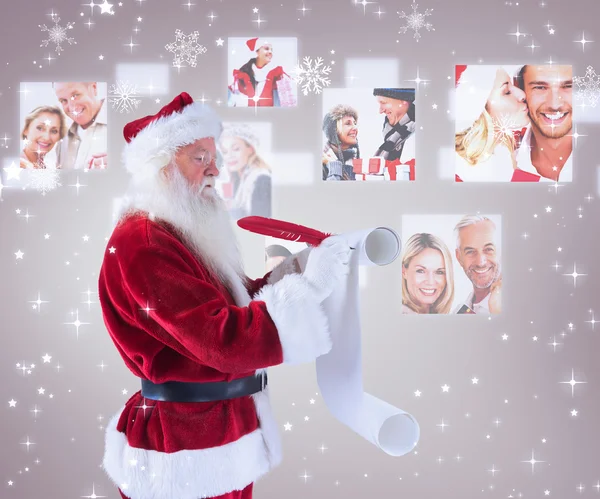 Kerstman schrijft een lijst — Stockfoto