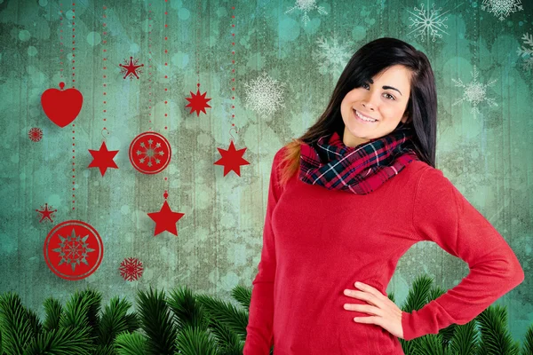 Brunette posing against christmas decorations — Stock Photo, Image