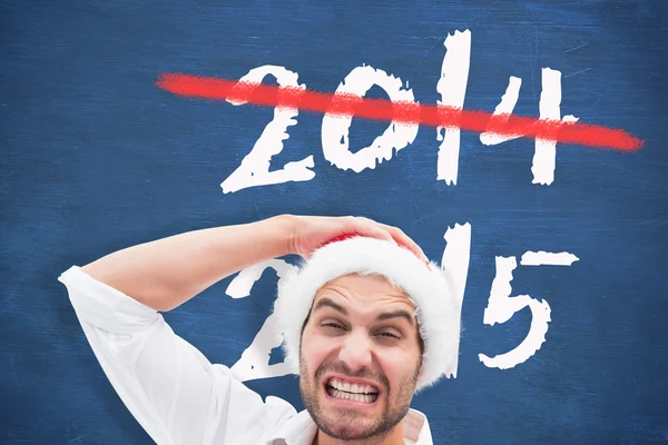 Festive man holding christmas gifts — Stock Photo, Image