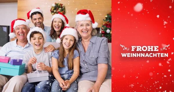 Extended family in christmas hats — Stock Photo, Image