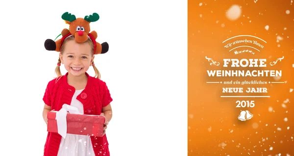 Cute little girl wearing rudolph headband — Stock Photo, Image