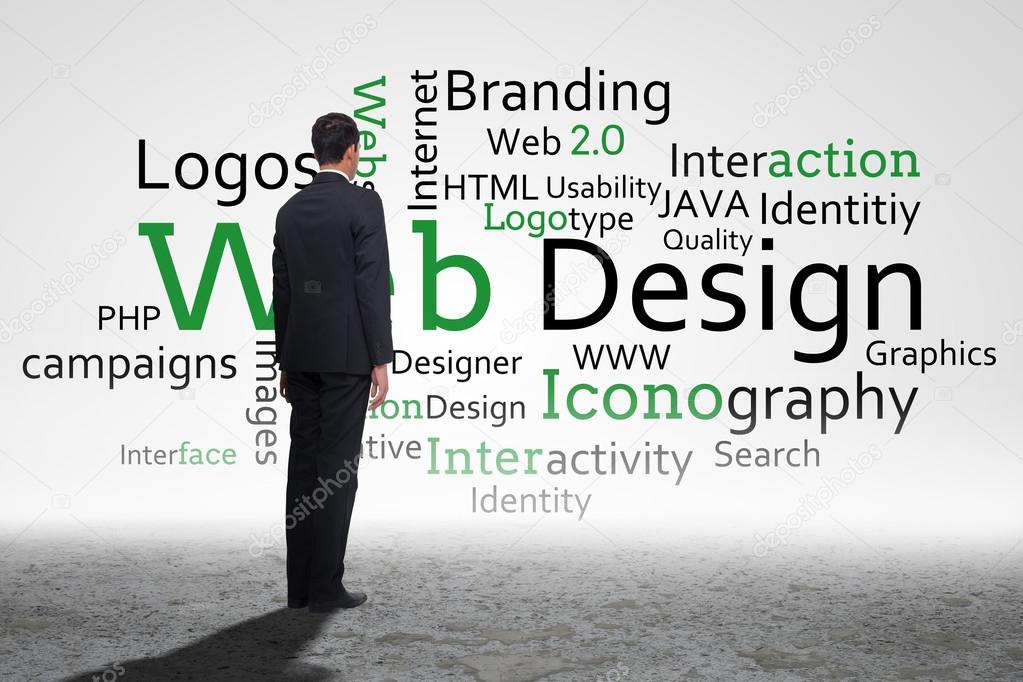 Businessman turning his back to camera against web design buzz words in desert
